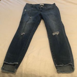 Distressed women’s jeans